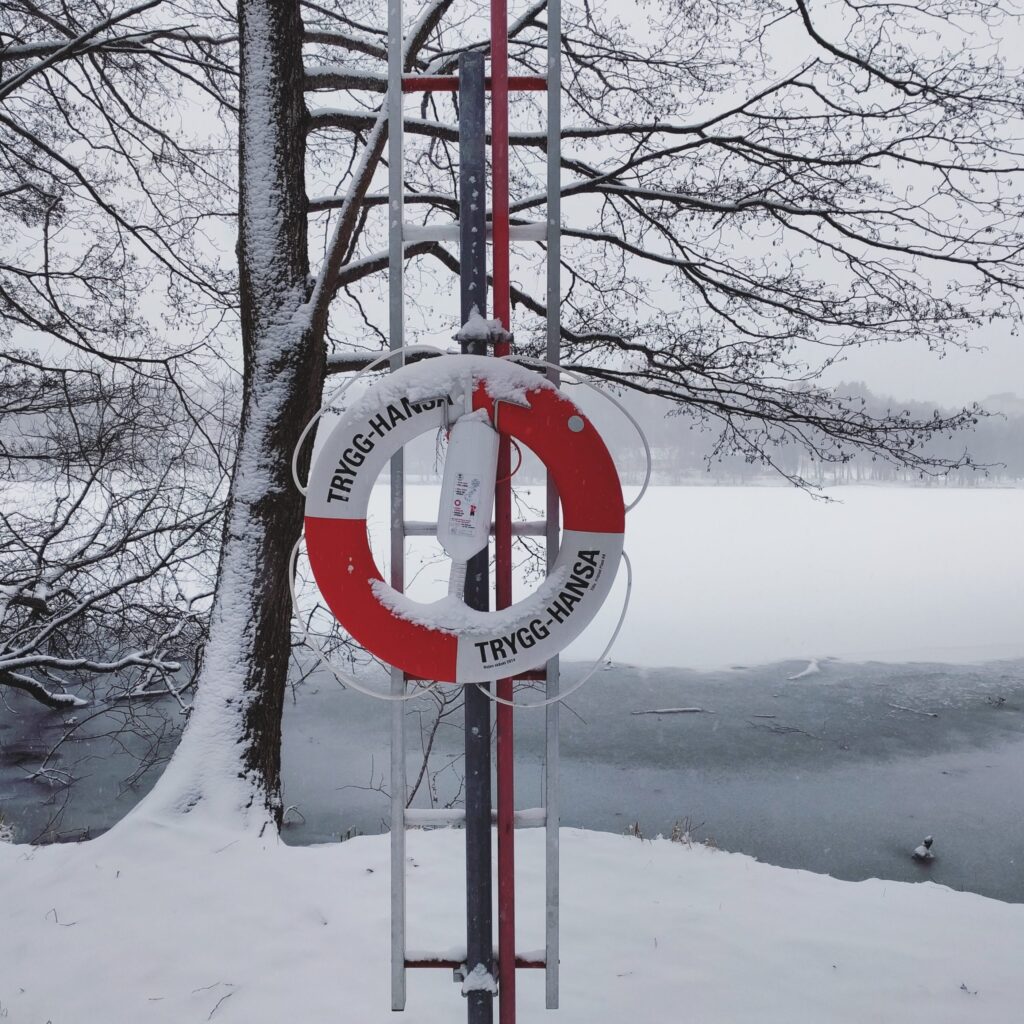 Trygg Hansa lifesaver at a beach in the winter covered in snow